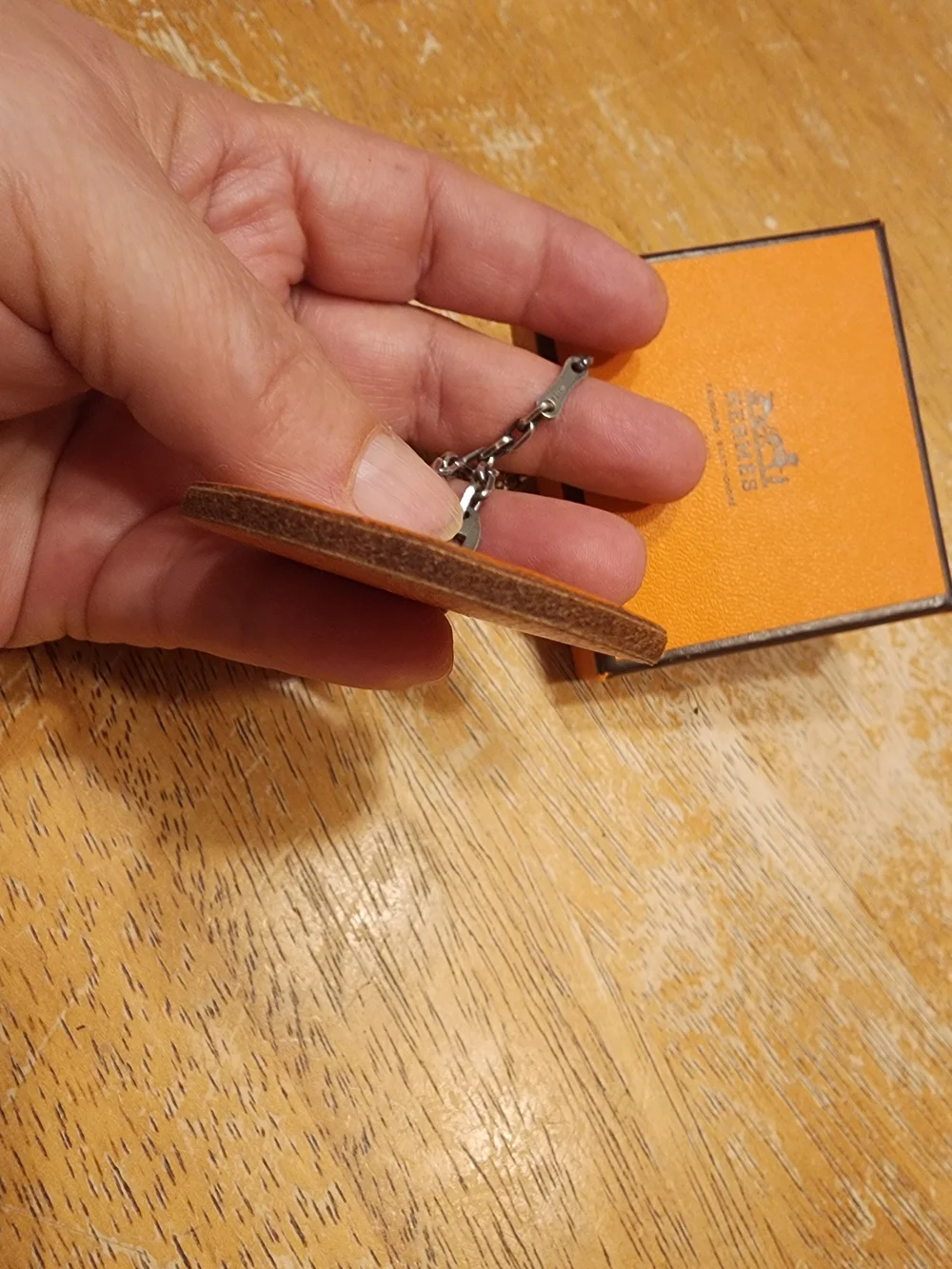 authentic Hermès orange fruit leather bag charm and keychain